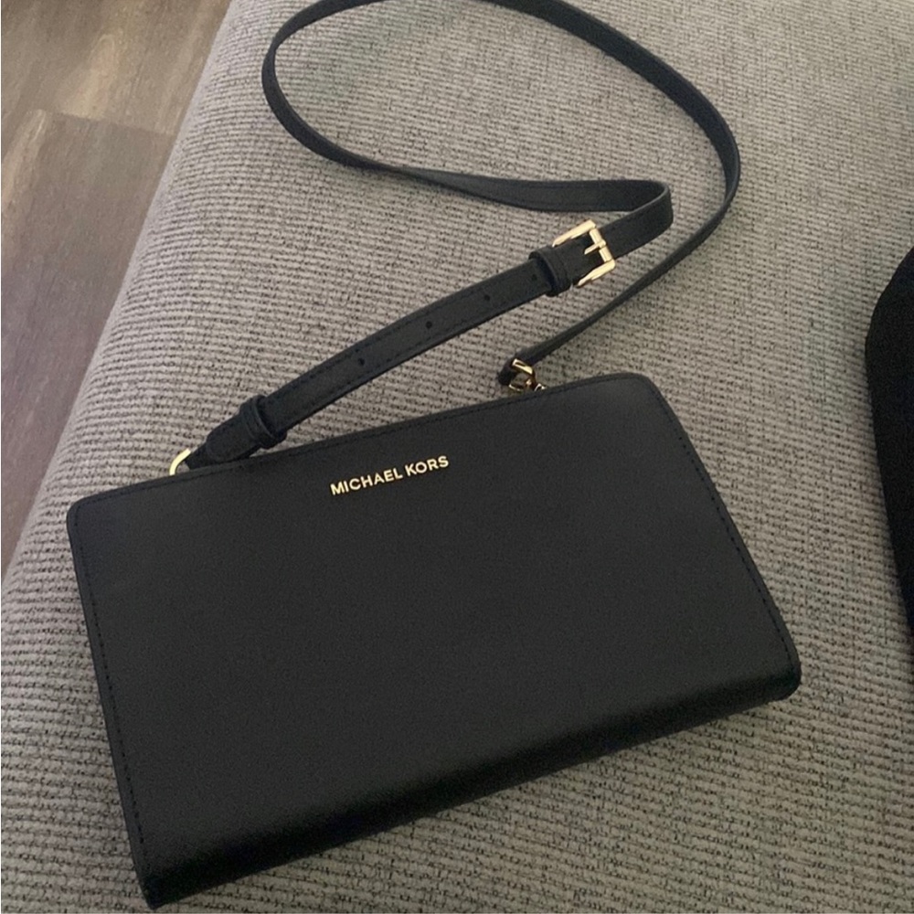 Only used once, Michael Kors crossover purse.